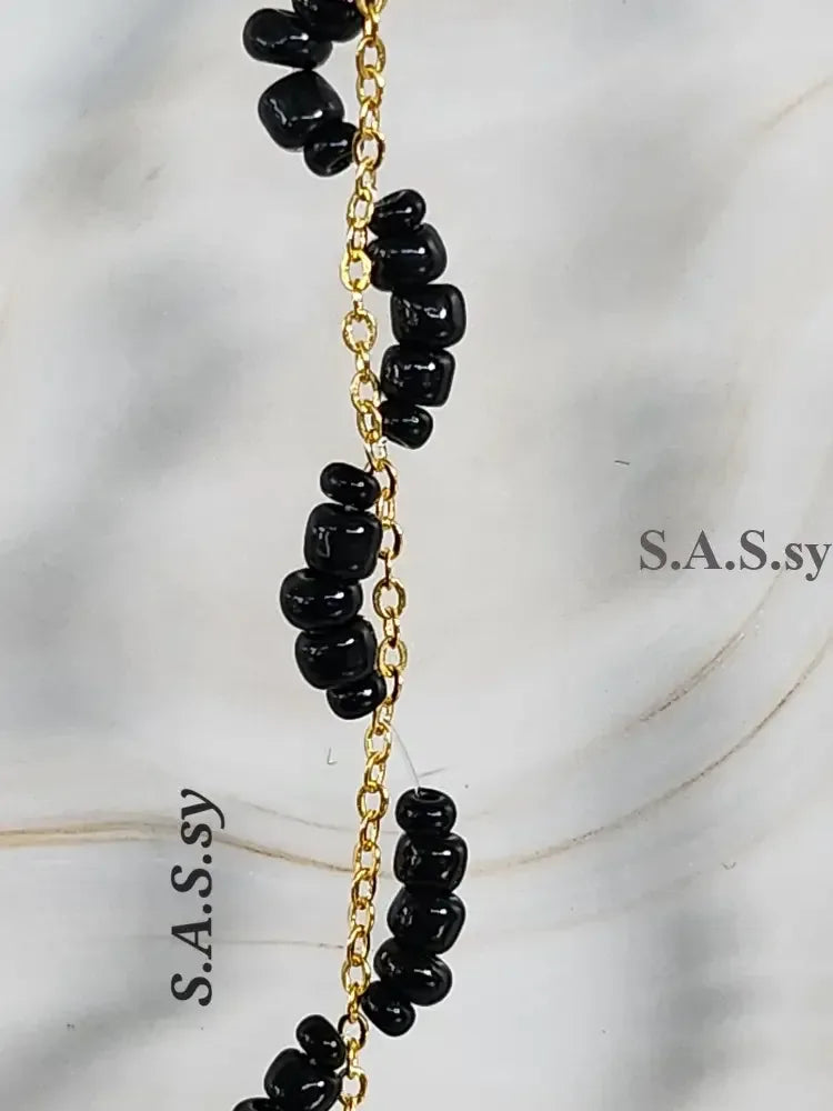 Black Seed Bead Threaded on Golden Chain - Sassy by Sharmin Aziz