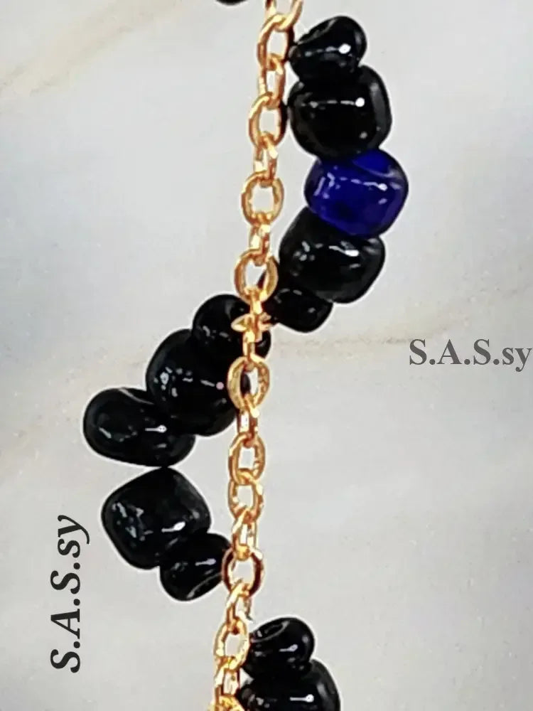 Black Seed Bead Threaded on Golden Chain - Sassy by Sharmin Aziz