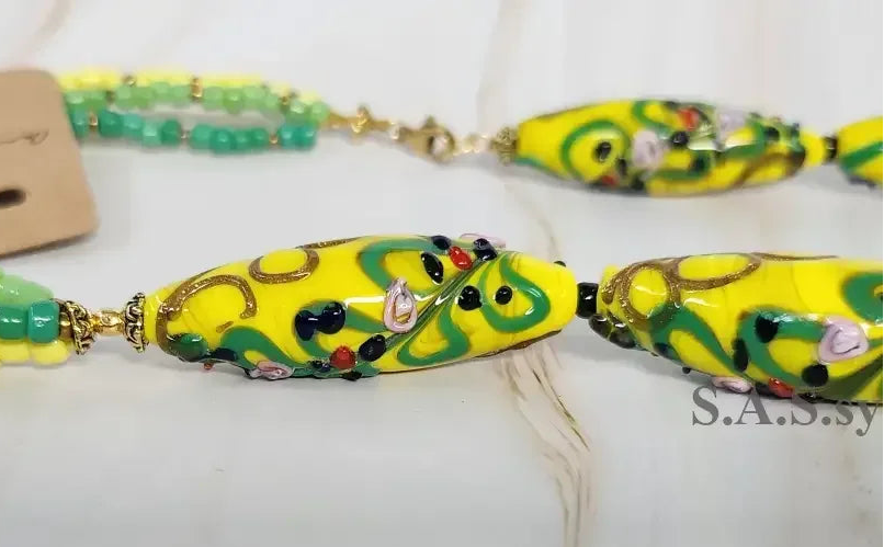 Close up yellow handmade glass bead necklace- Sassy by Sharmin Aziz