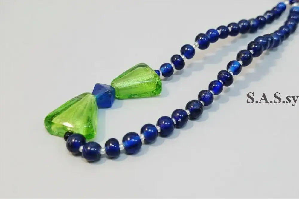 Blue beaded necklace with green triangle bead - Sassy by Sharmin Aziz
